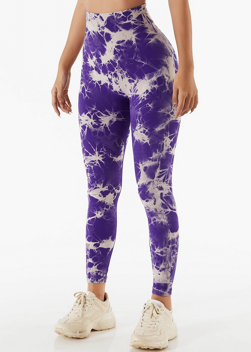Purple tie-dye women's seamless high waist leggings for fitness with elastic waistband, ideal for yoga and workouts.